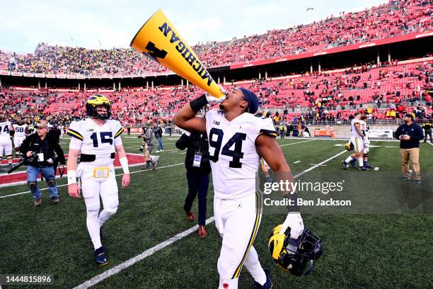 Kris Jenkins of the Michigan Wolverines celebrates a 45-23 victory over the Ohio State Buckeyes at Ohio Stadium on November 26, 2022 in Columbus,...