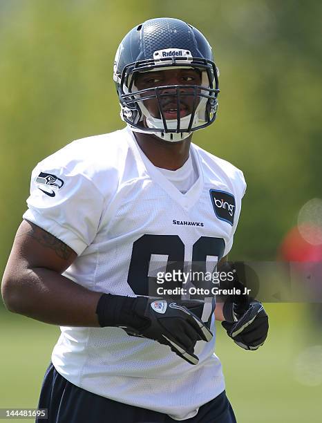Defensive end Greg Scruggs of the Seattle Seahawks looks on during minicamp at the Virginia Mason Athletic Center on May 11, 2012 in Renton,...