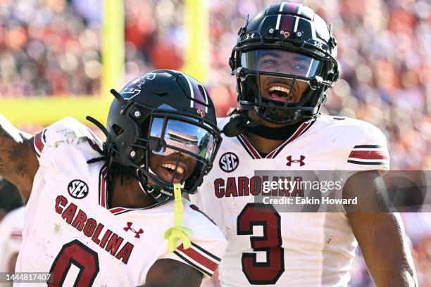 Jaheim Bell and Antwane Wells Jr. #3 of the South Carolina Gamecocks celebrate Bell's third quarter touchdown against the Clemson Tigers at Memorial...