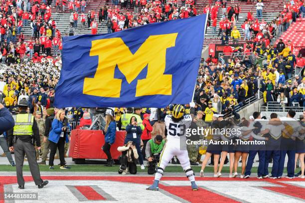 Trente Jones of the Michigan Wolverines celebrates after a college football game against the Ohio State Buckeyes at Ohio Stadium on November 26, 2022...