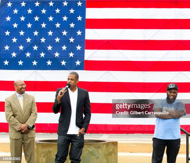 Philadelphia Mayor Michael Nutter, Jay-Z and rapper Freeway attend the press conference announcing Budweiser Made in America music festival at...