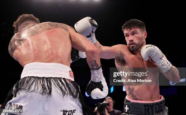 Zach Parker of Great Britain exchanges punches with John Ryder of Great Britain during the WBO International Super-Middleweight Title fight between...