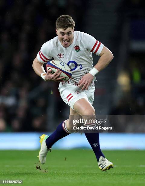 Tommy Freeman of England runs with the ball during the Autumn International match between England and South Africa at Twickenham Stadium on November...