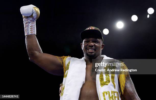 Dillian Whyte of Great Britain cheers after defeating Jermaine Franklin of the United States by points during their International Heavyweight fight...
