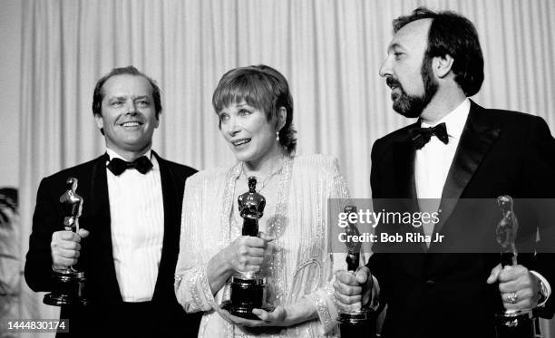 Shirley MacLaine, Jack Nicholson and James L. Brooks enjoy a winning moment together backstage at the 56th Annual Academy Awards Show, April 9, 1984...