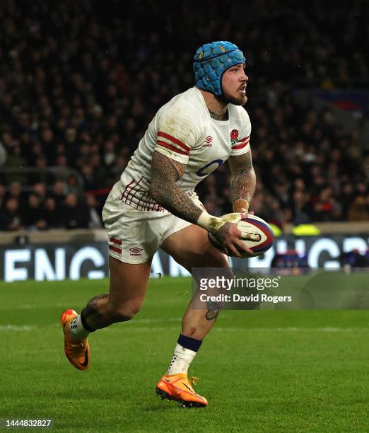 Jack Nowell of England runs with the ball during the Autumn International match between England and South Africa at Twickenham Stadium on November...