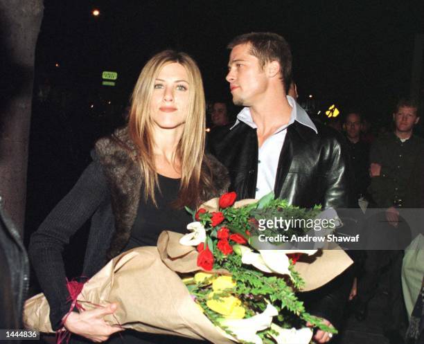 Hollywood''s hottest couple Jennifer Aniston and Brad Pitt leave The Barfly nightclub where he threw a big birthday party for her February 6, 1999 in...