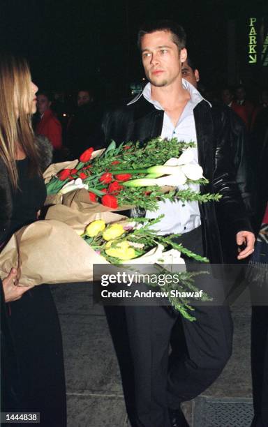 Hollywood''s hottest couple Jennifer Aniston and Brad Pitt leave The Barfly nightclub where he threw a big birthday party for her February 6, 1999 in...