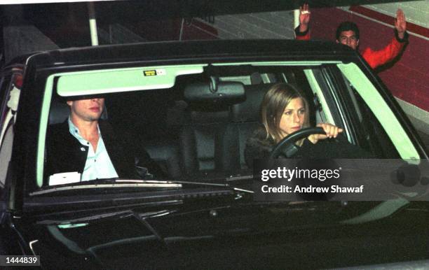 Hollywood''s hottest couple Jennifer Aniston and Brad Pitt leave The Barfly nightclub where he threw a big birthday party for her February 6, 1999 in...