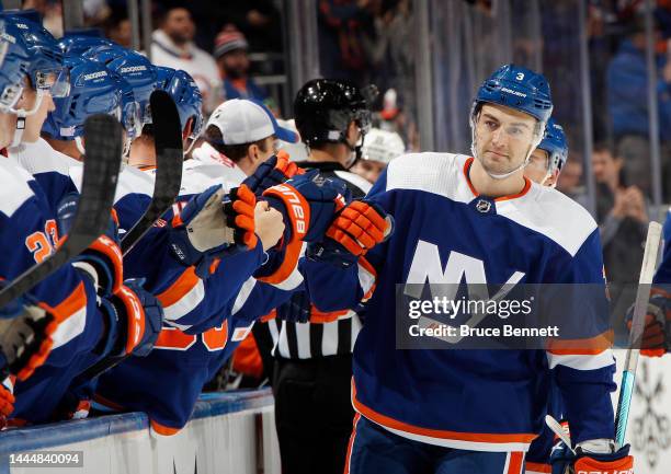 Adam Pelech of the New York Islanders celebrates his first period goal against the Philadelphia Flyers at the UBS Arena on November 26, 2022 in...