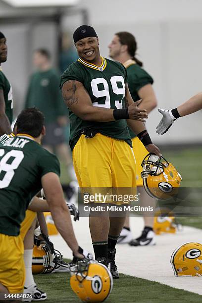 Jerel Worthy of the Green Bay Packers takes to the field during mini camp at the Don Hutson Center on May 11, 2012 in Green Bay, Wisconsin.