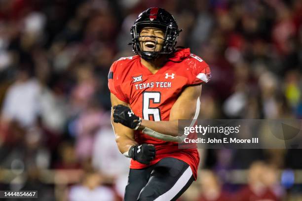 Linebacker Kosi Eldridge of the Texas Tech Red Raiders celebrates after a turnover during the first half against the Oklahoma Sooners at Jones AT&T...