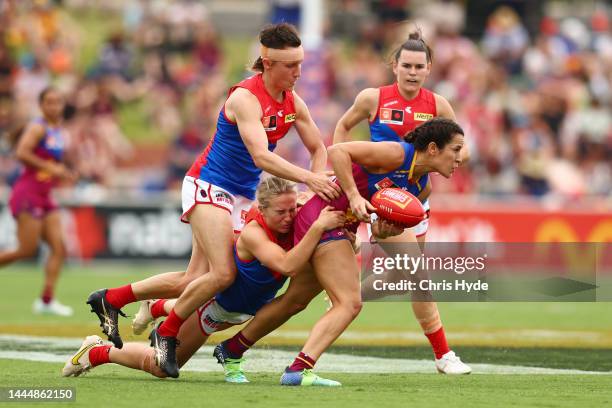 Alexandra Anderson of the Lions is tackled during the AFLW Grand Final match between the Brisbane Lions and the Melbourne Demons at Brighton Homes...