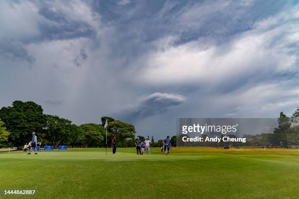 Players move off the 13th green after play is suspended due to potential lightning in the area during Day 4 of the 2022 Australian PGA Championship...