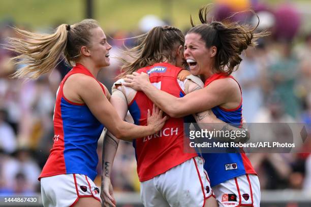 Tayla Harris of the Demons celebrates kicking a goal with team mates during the AFLW Grand Final match between the Brisbane Lions and the Melbourne...