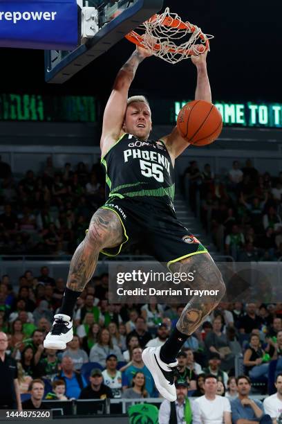 Mitchell Creek of the Phoenix dunks the ball during the round 8 NBL match between South East Melbourne Phoenix and Illawarra Hawks at John Cain...