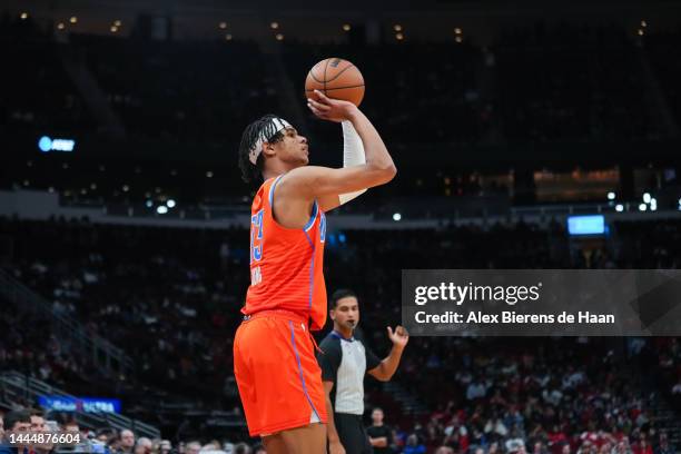 Ousmane Dieng of the Oklahoma City Thunder shoots a three point shot during the game against the Houston Rockets at Toyota Center on November 26,...