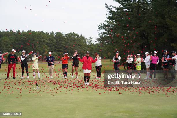 Winner Miyuu Yamashita of Japan and golfers pose at the award ceremony after the final round of the JLPGA Tour Championship Ricoh Cup at Miyazaki...