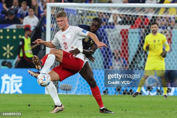 Andreas Cornelius of Denmark kicks the ball during the FIFA World Cup Qatar 2022 Group D match between France and Denmark at Stadium 974 on November...