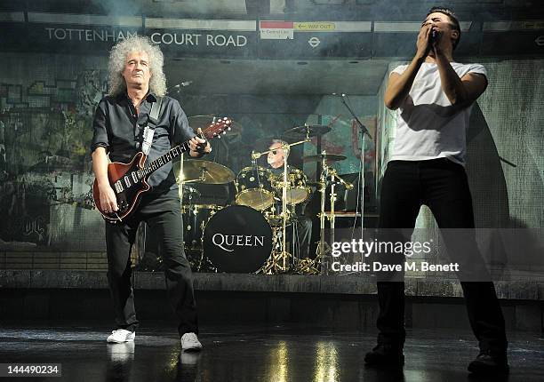 Queen musicians Brian May and Roger Taylor perform onstage with cast member Noel Sullivan during the We Will Rock You 10 Year Anniversary Celebration...