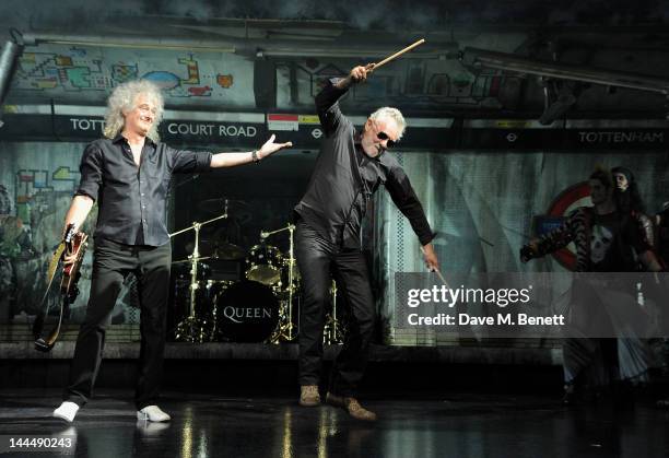 Queen musicians Brian May and Roger Taylor perform during the We Will Rock You 10 Year Anniversary Celebration performance at The Dominion Theatre on...