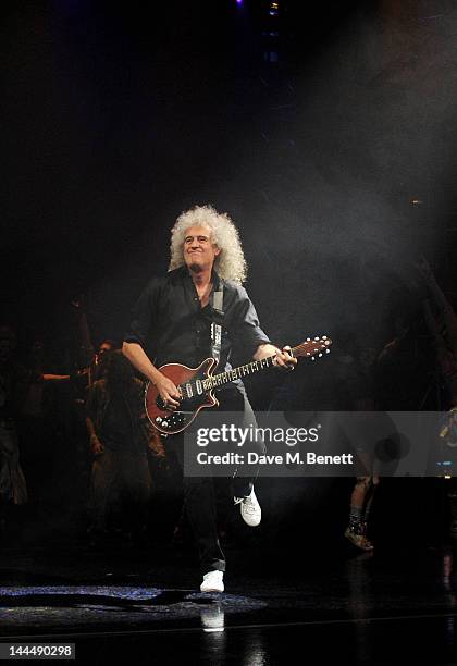 Queen musician Brian May performs during the We Will Rock You 10 Year Anniversary Celebration performance at The Dominion Theatre on May 14, 2012 in...