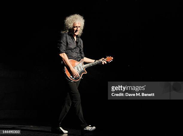 Queen musician Brian May performs during the We Will Rock You 10 Year Anniversary Celebration performance at The Dominion Theatre on May 14, 2012 in...