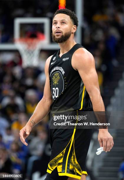 Stephen Curry of the Golden State Warriors looks on against the Utah Jazz during the fourth quarter of an NBA basketball game at Chase Center on...