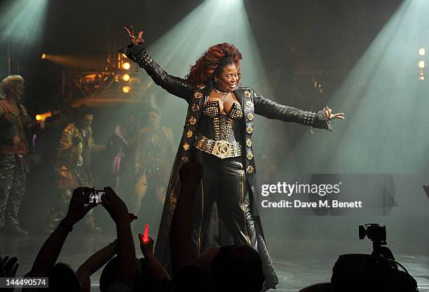 Cast member Brenda Edwards bows at the curtain call during the We Will Rock You 10 Year Anniversary Celebration performance at The Dominion Theatre...