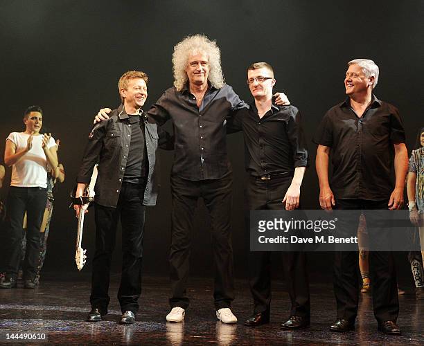 Queen musician Brian May bows with band members at the curtain call during the We Will Rock You 10 Year Anniversary Celebration performance at The...