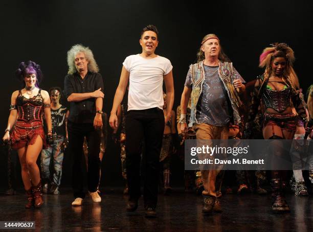 Queen musician Brian May bows with cast members including Sarah French, Noel Sullivan, Kevin Kennedy and Rachel John at the curtain call during the...