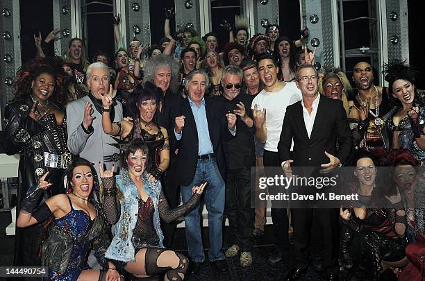 Brian May, Robert De Niro, Jim Beach, Roger Taylor, Phil McIntyre and Ben Elton celebrate with cast and crew backstage after the We Will Rock You 10...