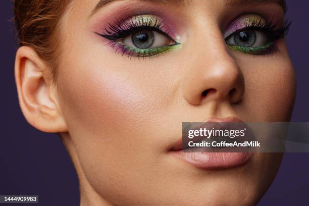 beautiful woman with bright make-up - stage make up stock pictures, royalty-free photos & images