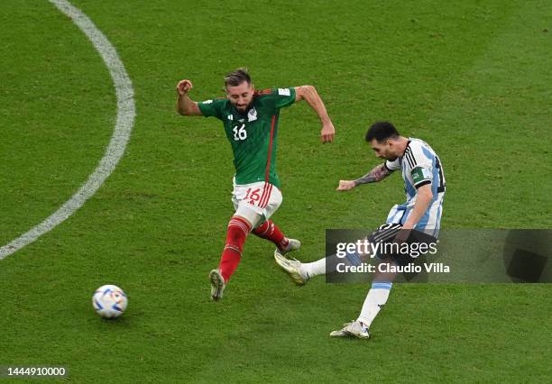 Lionel Messi of Argentina scores their team's first goal during the FIFA World Cup Qatar 2022 Group C match between Argentina and Mexico at Lusail...