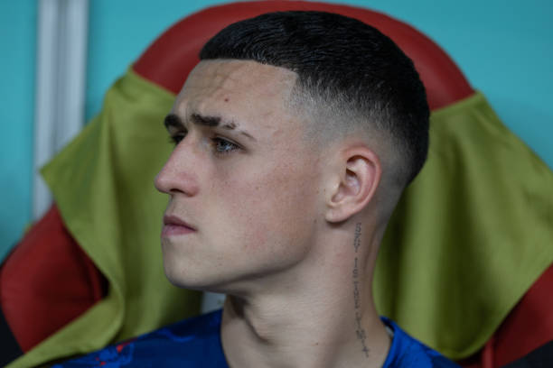 November, 25: England substitute Phil Foden looks on from the bench during the FIFA World Cup Qatar 2022 Group B match between England and USA at Al...
