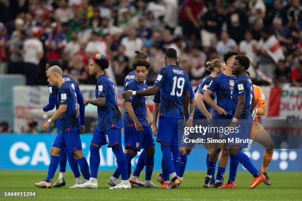 November, 25: USA leave a team huddle led by Tyler Adams of USA during the FIFA World Cup Qatar 2022 Group B match between England and USA at Al Bayt...