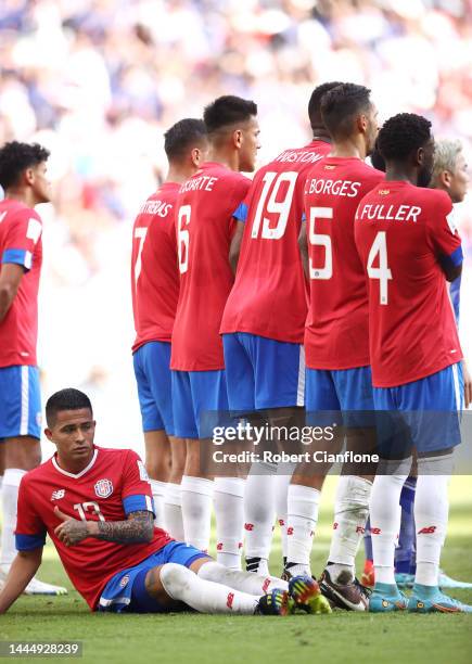 Costa Rica players defend a free kick during the FIFA World Cup Qatar 2022 Group E match between Japan and Costa Rica at Ahmad Bin Ali Stadium on...