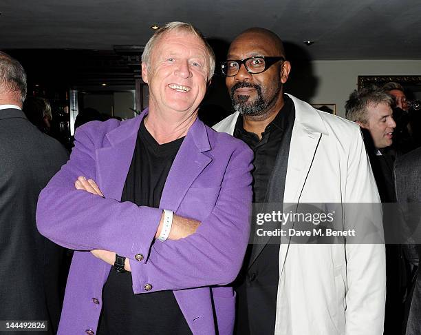 Chris Tarrant and Lenny Henry celebrate backstage after the We Will Rock You 10 Year Anniversary performance at The Dominion Theatre on May 14, 2012...