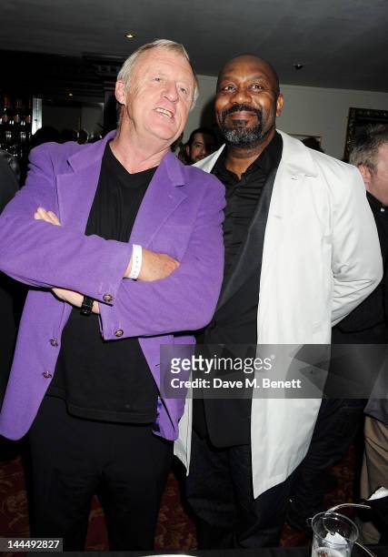 Chris Tarrant and Lenny Henry celebrate backstage after the We Will Rock You 10 Year Anniversary performance at The Dominion Theatre on May 14, 2012...