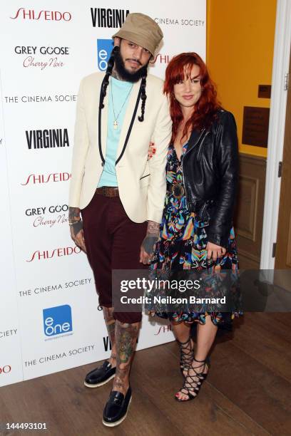 Travie McCoy and Juliette Lewis attend a screening of "Virginia" hosted by The Cinema Society & Shiseido with Grey Goose at Crosby Street Hotel on...