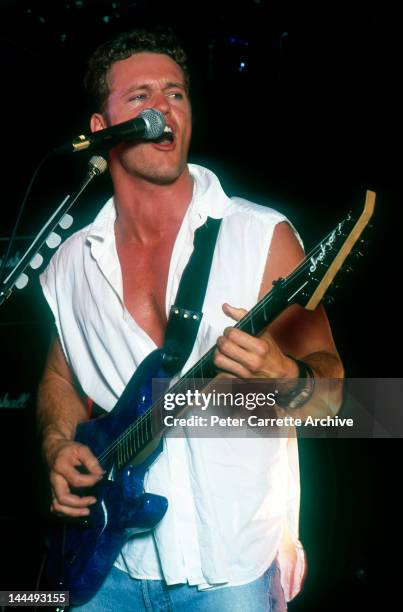 Australian singer and actor Craig McLachlan perfoming live on stage during a concert in the 1990s in Australia.