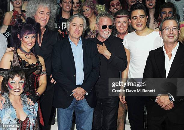 Brian May, Robert De Niro, Roger Taylor, cast member Noel Sullivan and Ben Elton celebrate with cast and crew backstage after the We Will Rock You 10...