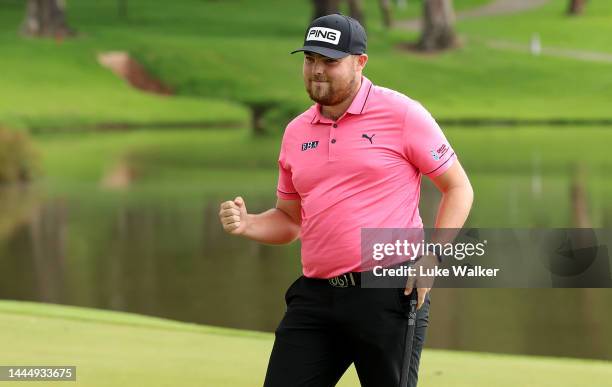 Dan Bradbury of England celebrates on the 18th hole during the final round of the Joburg Open at Houghton GC on November 27, 2022 in Johannesburg,...