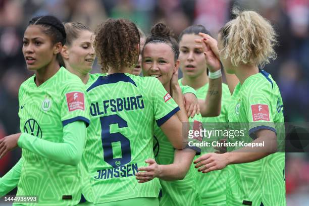 Marina Hegerin of Wolfsburg celebrates the first goal with her team mates during the FLYERALRM Frauen-Bundesliga match between 1. FC Koeln and VfL...