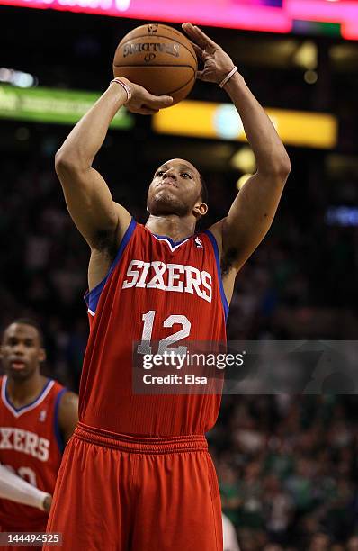 Evan Turner of the Philadelphia 76ers shoots a free throw in the final seconds of the game against the Boston Celtics in Game Two of the Eastern...