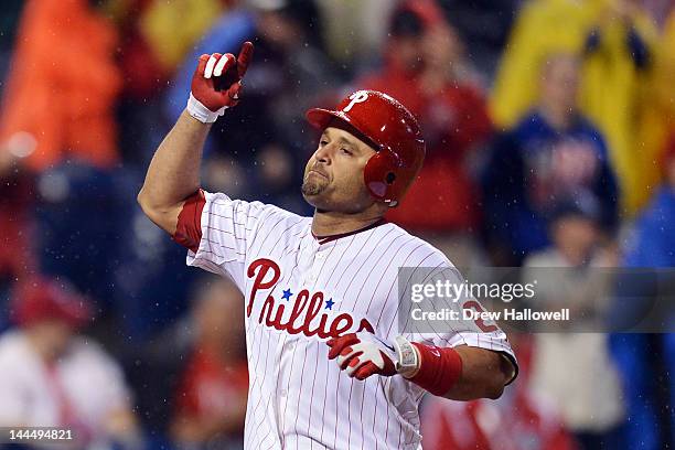 Placido Polanco of the Philadelphia Phillies celebrates a two run home run and his 2000th hits of his career during the game against the Houston...