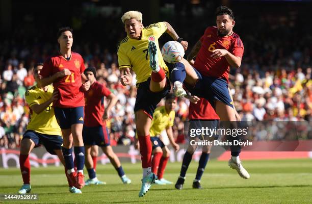 Telmo of Spain battles for possession against Erick Pabon of Colombia during the semi-finals match between Spain and Colombia in the Stream World...