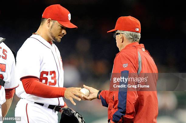 Manager Davey Johnson of the Washington Nationals removes Henry Rodriguez from the game in the ninth inning against the San Diego Padres at Nationals...