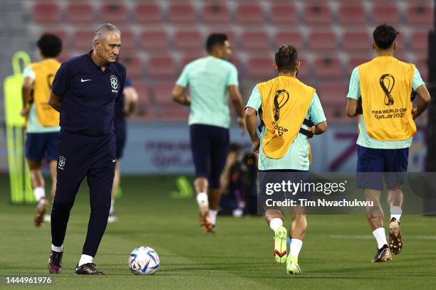 Adenor Leonardo Bacchi, Head Coach of Brazil, looks on during the Brazil match day -1 training session at Grand Hamad Stadium on November 27, 2022 in...