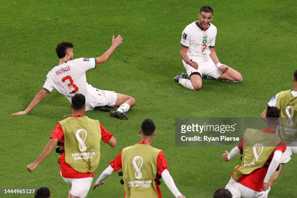 Noussair Mazraoui and Hakim Ziyech of Morocco celebrate their second goal by Zakaria Aboukhlal during the FIFA World Cup Qatar 2022 Group F match...